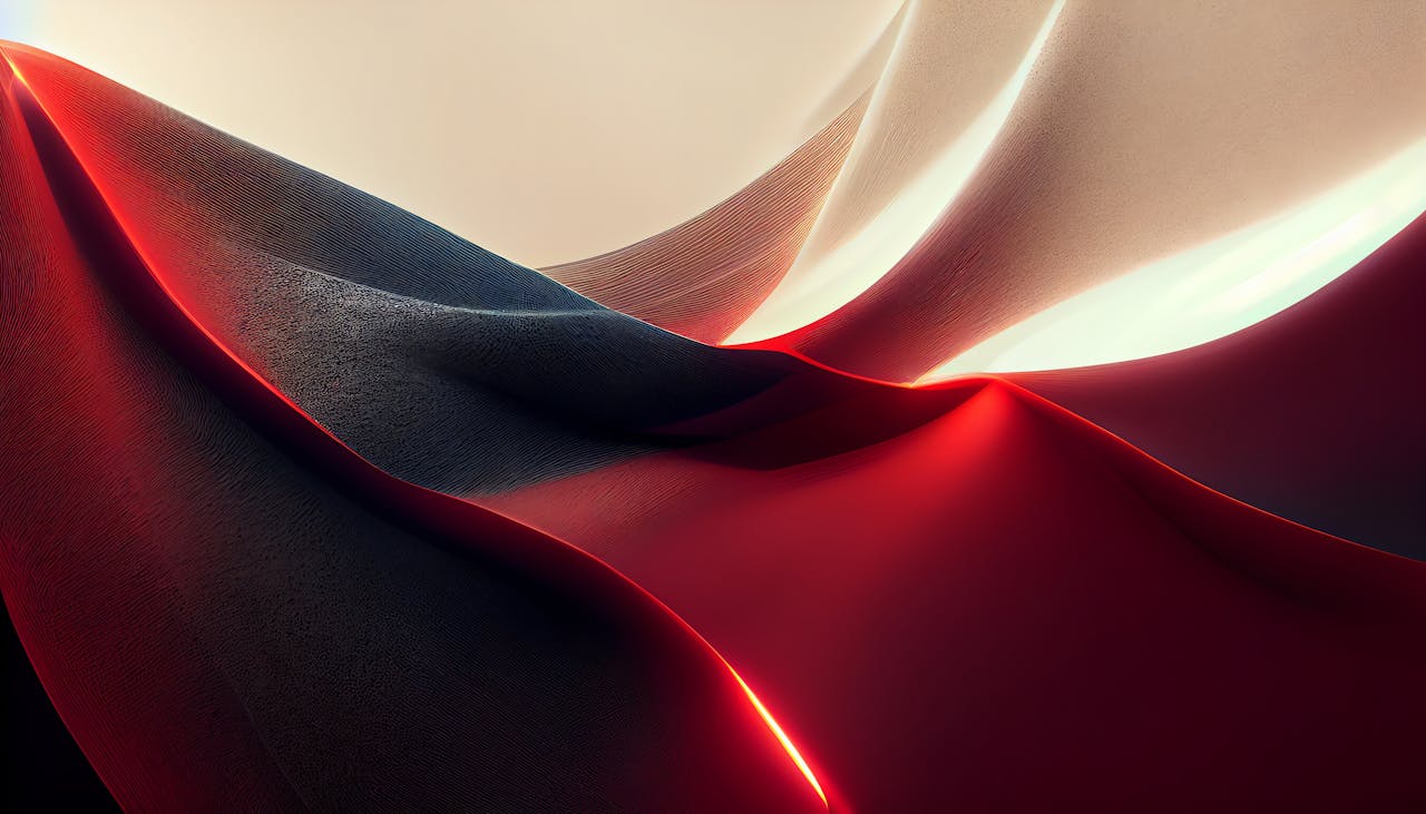An artistic view of abstract fabric waves in red and black, conveying movement and fluidity.